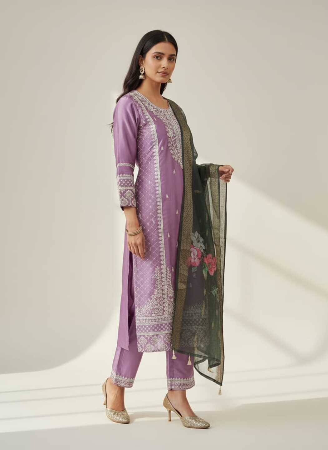 Three images showing a women's purple kurti pant set with dupatta from Crazy Needle Online, featuring embroidered details and traditional style.