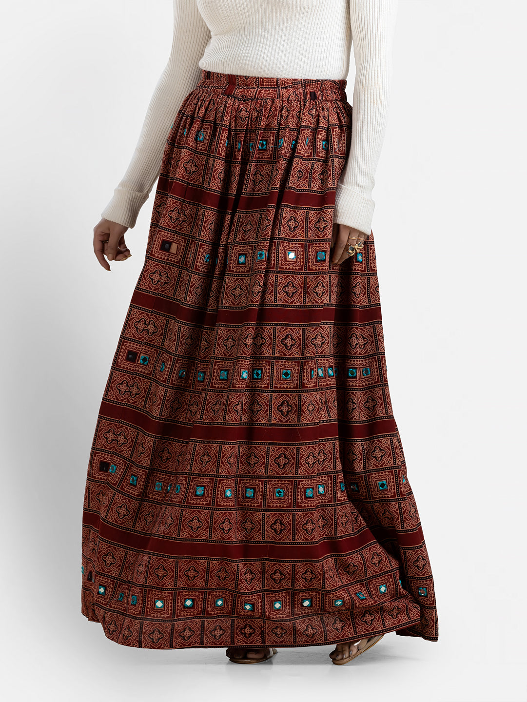 Maroon women's Ajrakh printed long skirt from Crazy Needle Online, featuring traditional block print and flowing fabric.