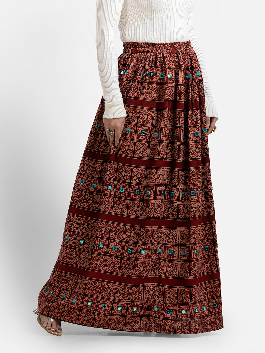 Maroon Ajrakh printed long skirt for women by Crazy Needle Online, featuring traditional geometric patterns and flowing fabric.