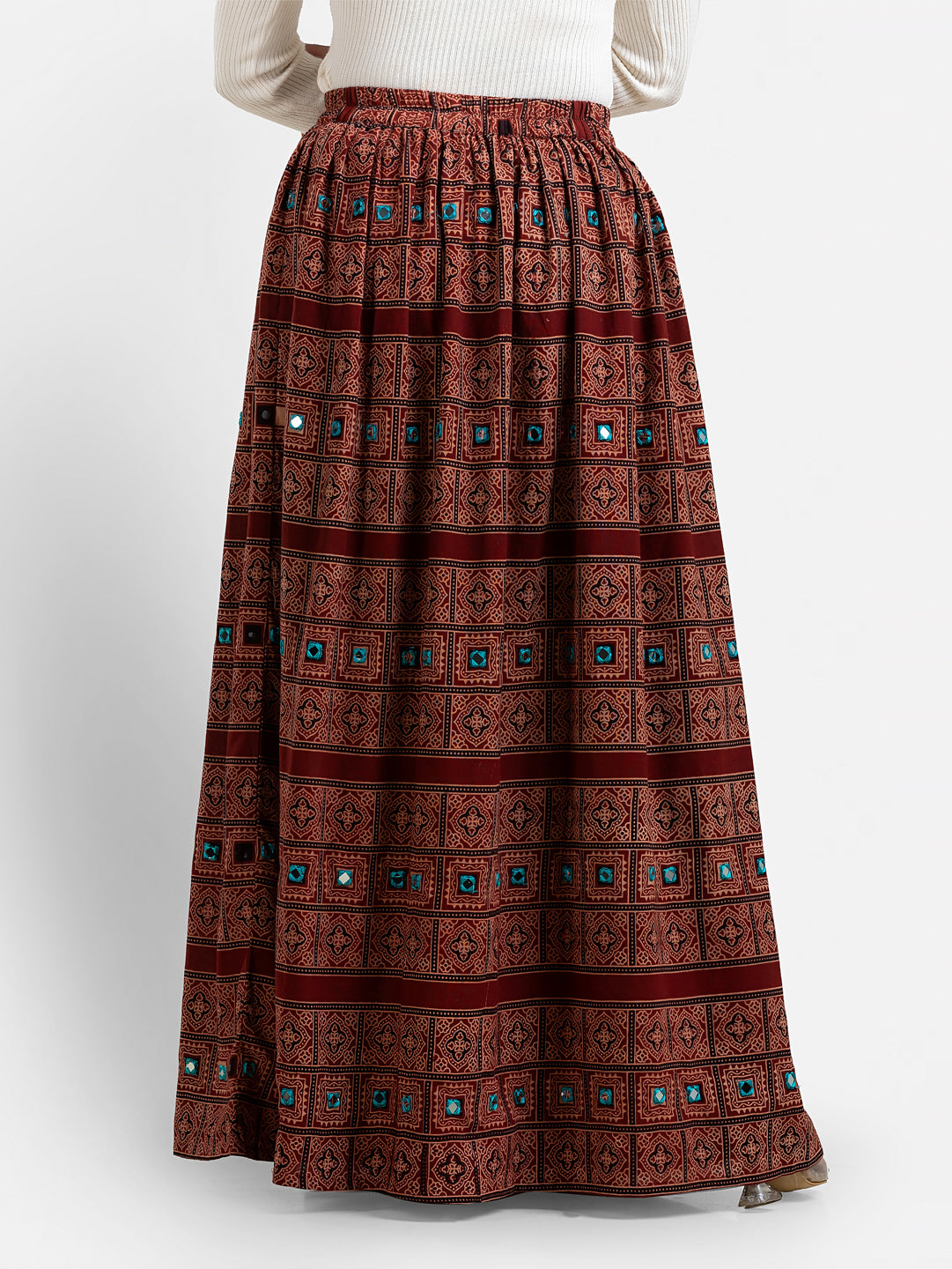 Maroon women's Ajrakh printed long skirt with traditional patterns, made by Crazy Needle Online, flowing and vibrant.