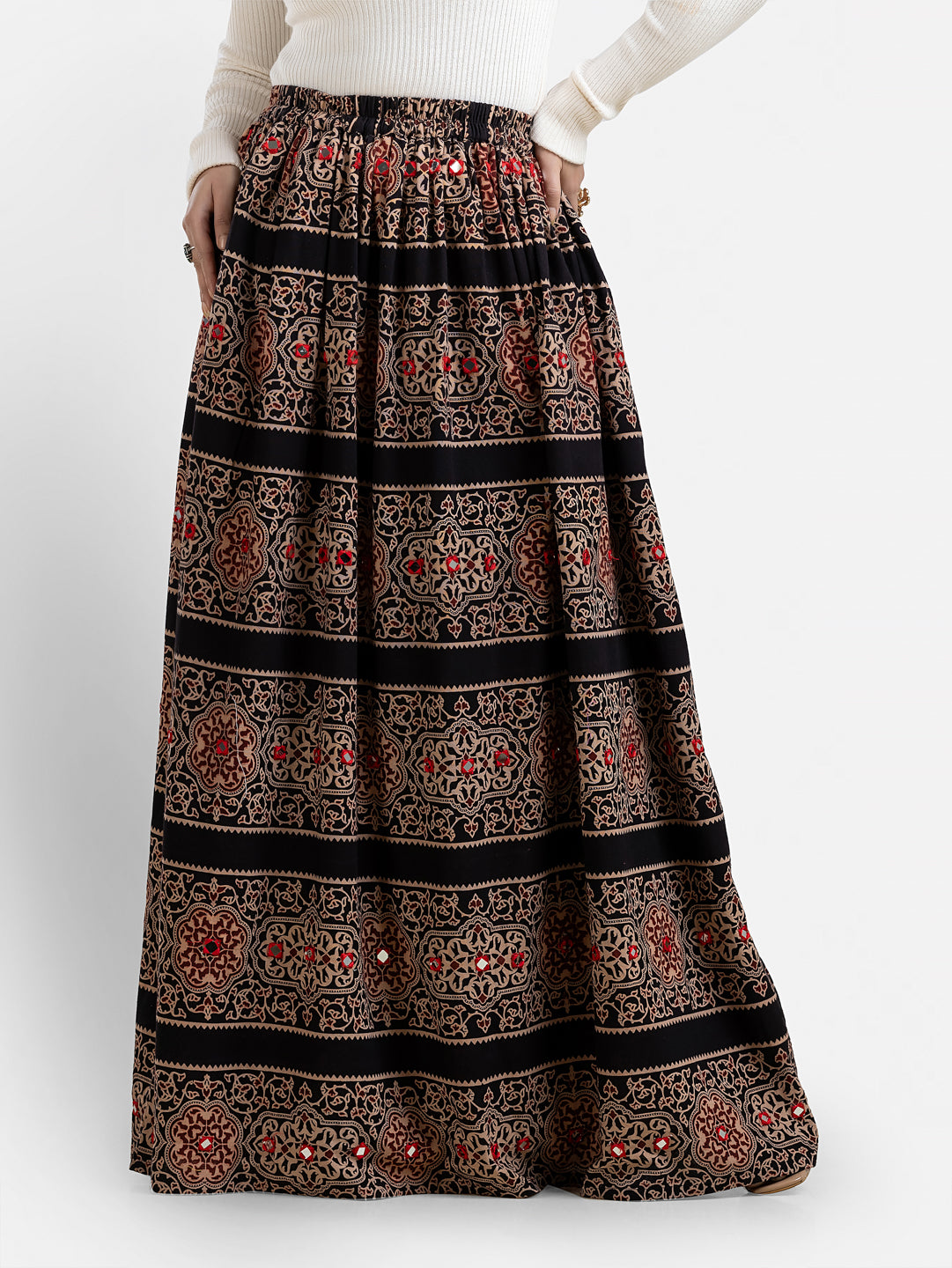Women's printed black long skirt by Crazy Needle Online, flowing skirt with floral pattern and comfortable waist fit.