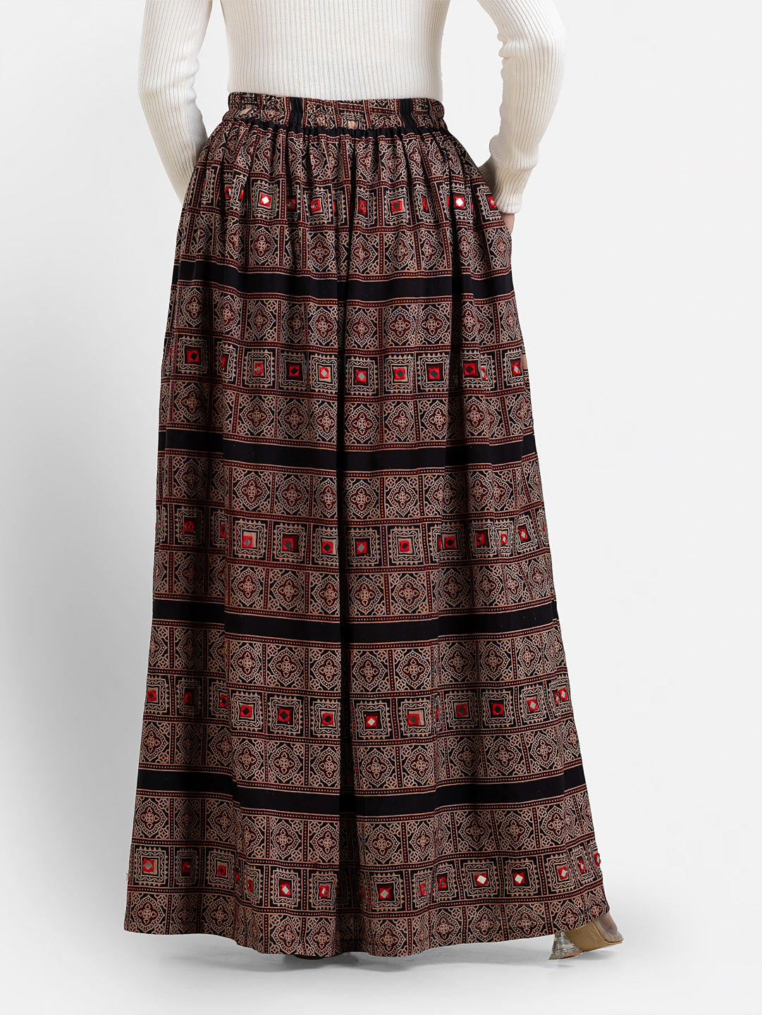 Black paisley printed women's skirt by Crazy Needle Online, featuring a stylish and flowy design.