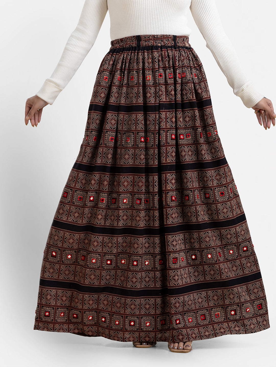 Black paisley printed women's skirt by Crazy Needle Online, featuring a stylish and flowing design.