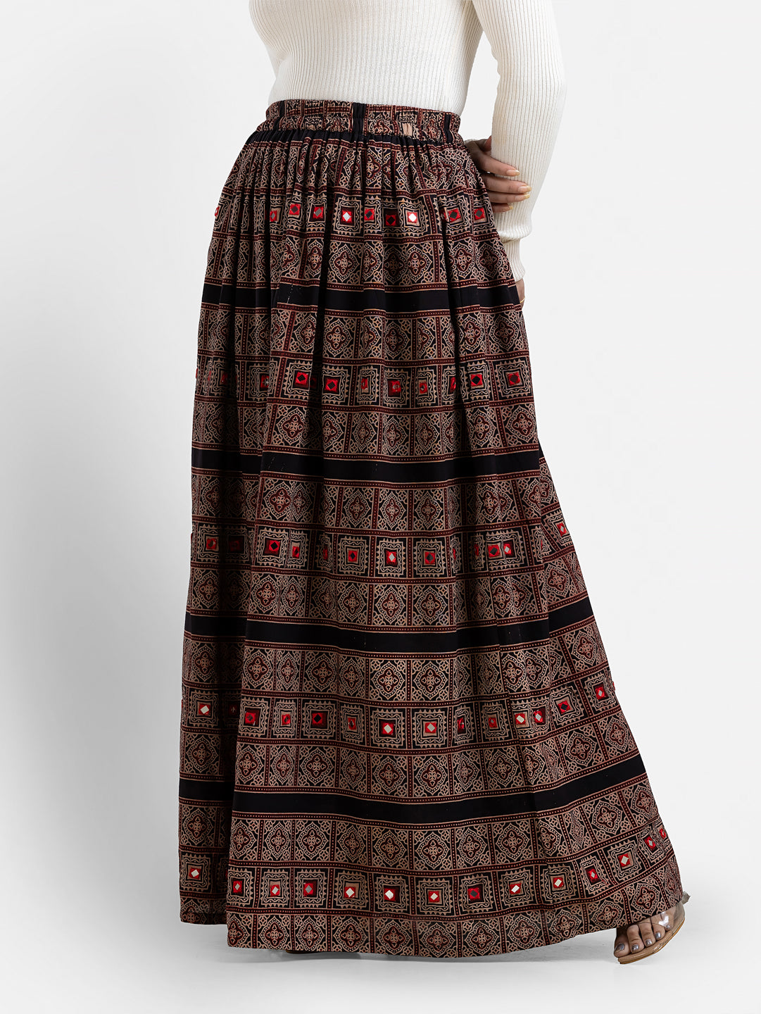 Black women's paisley printed skirt by Crazy Needle Online, showcasing a flowy design with intricate paisley patterns.
