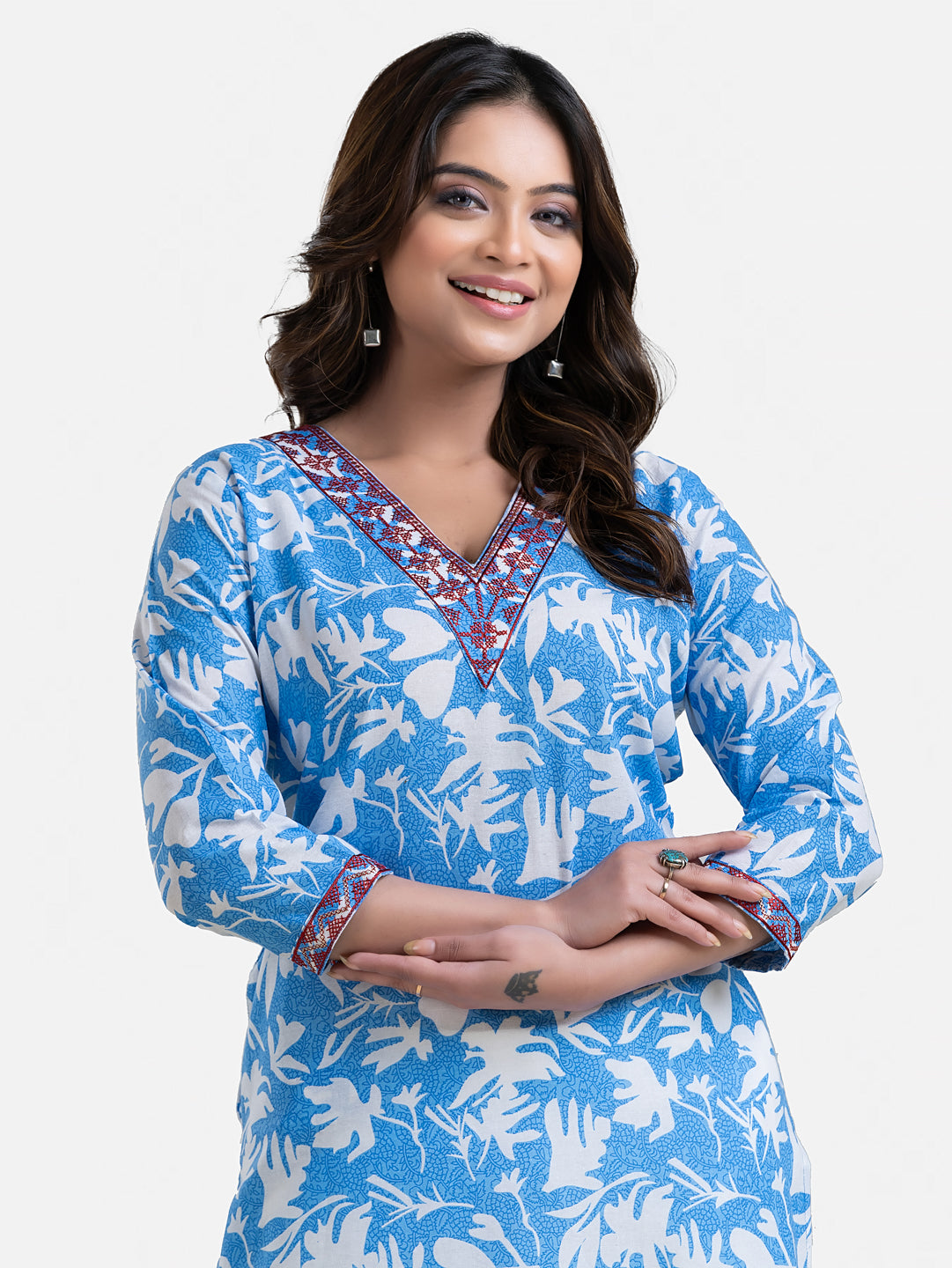 Sky blue printed women's kurti with V-neck design from Crazy Needle Online, featuring floral patterns and comfortable fabric.