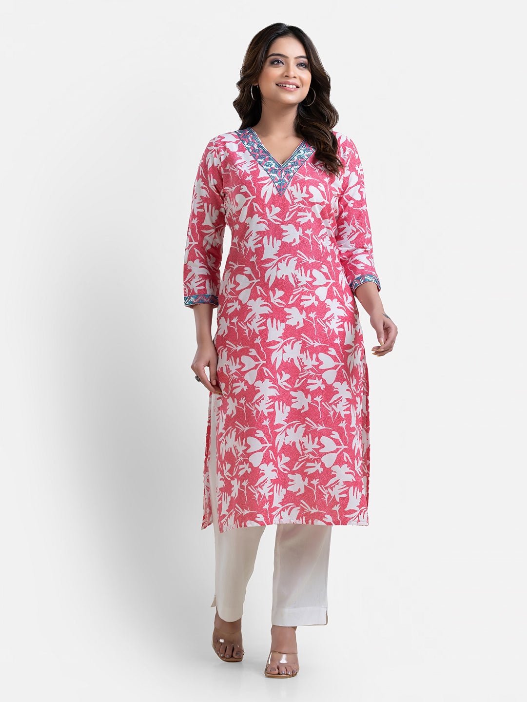 Pink printed women's kurti with V-neck design from Crazy Needle Online, showcasing a vibrant, stylish Indian ethnic outfit.