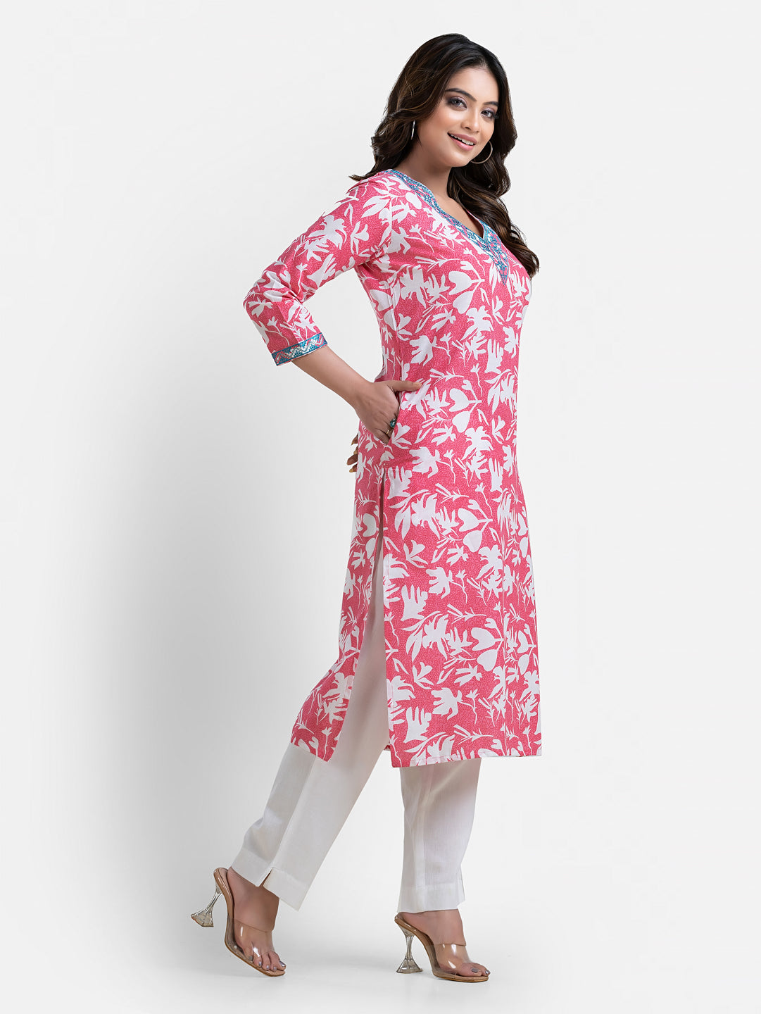 Pink printed women's V-neck kurti by Crazy Needle Online, showcasing a comfortable and stylish traditional Indian outfit.