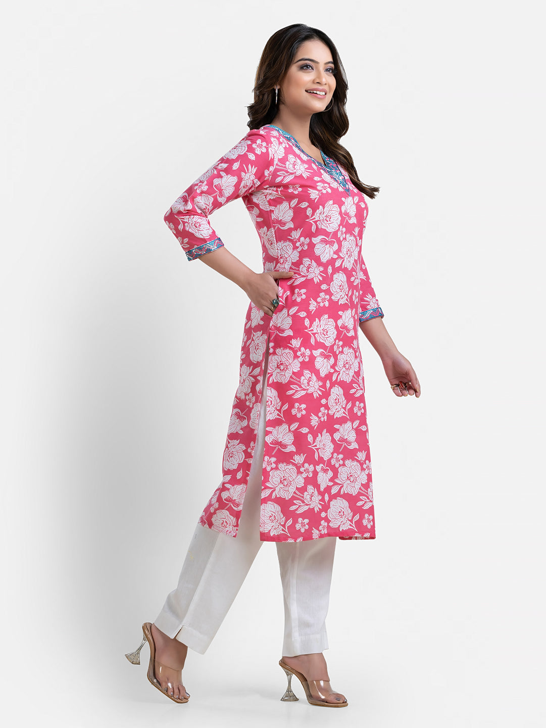Pink printed women's kurti with V-neck design from Crazy Needle Online, featuring floral patterns and comfortable fabric.