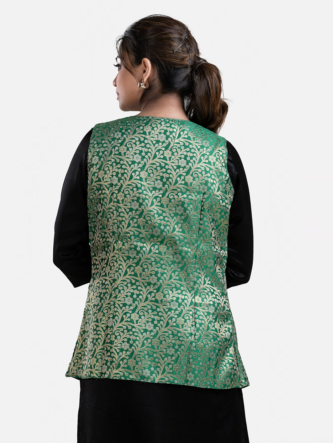 Women's green sleeveless brocade jacket from Crazy Needle Online, featuring intricate fabric and stylish design.