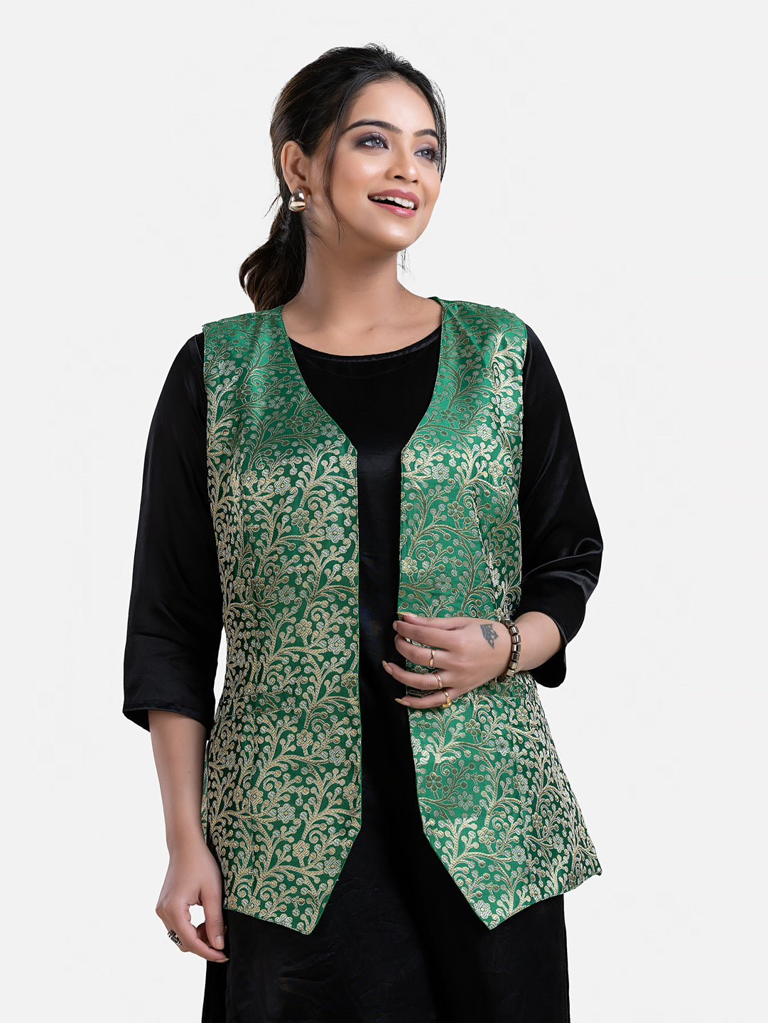 Women’s sleeveless green brocade jacket from Crazy Needle Online, stylish and intricate fabric design.