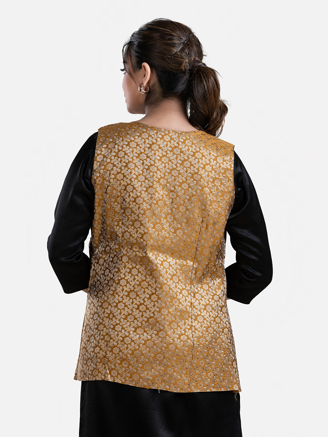 Women's yellow sleeveless brocade jacket by Crazy Needle Online, featuring intricate fabric design and tailored fit.