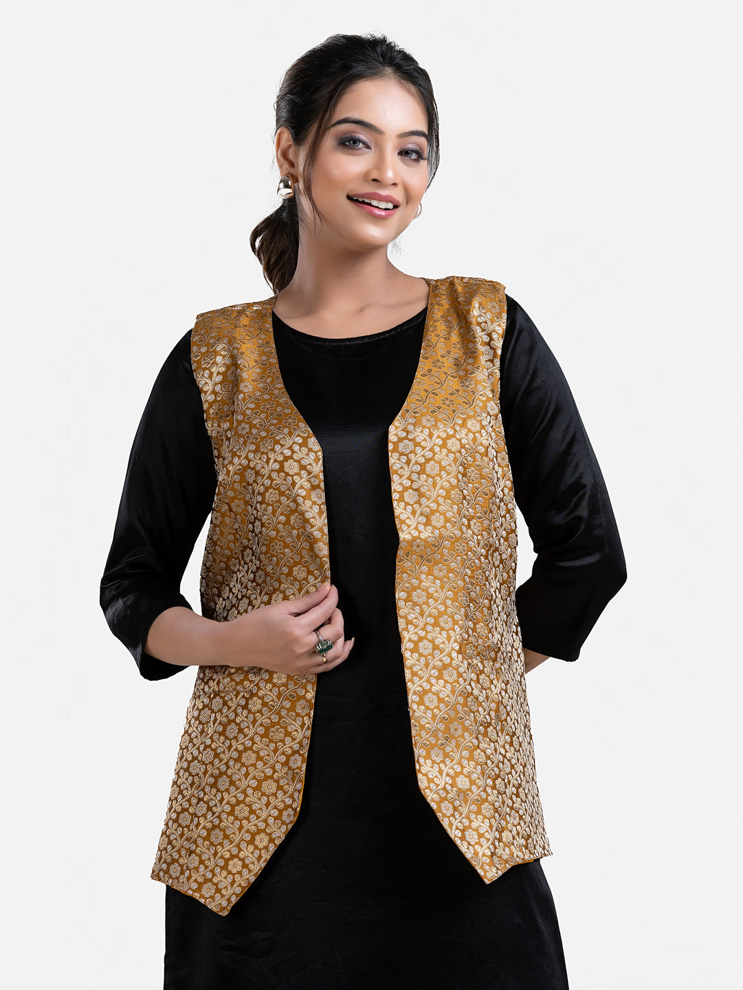 Women's yellow sleeveless brocade jacket by Crazy Needle Online, featuring intricate fabric and stylish design.
