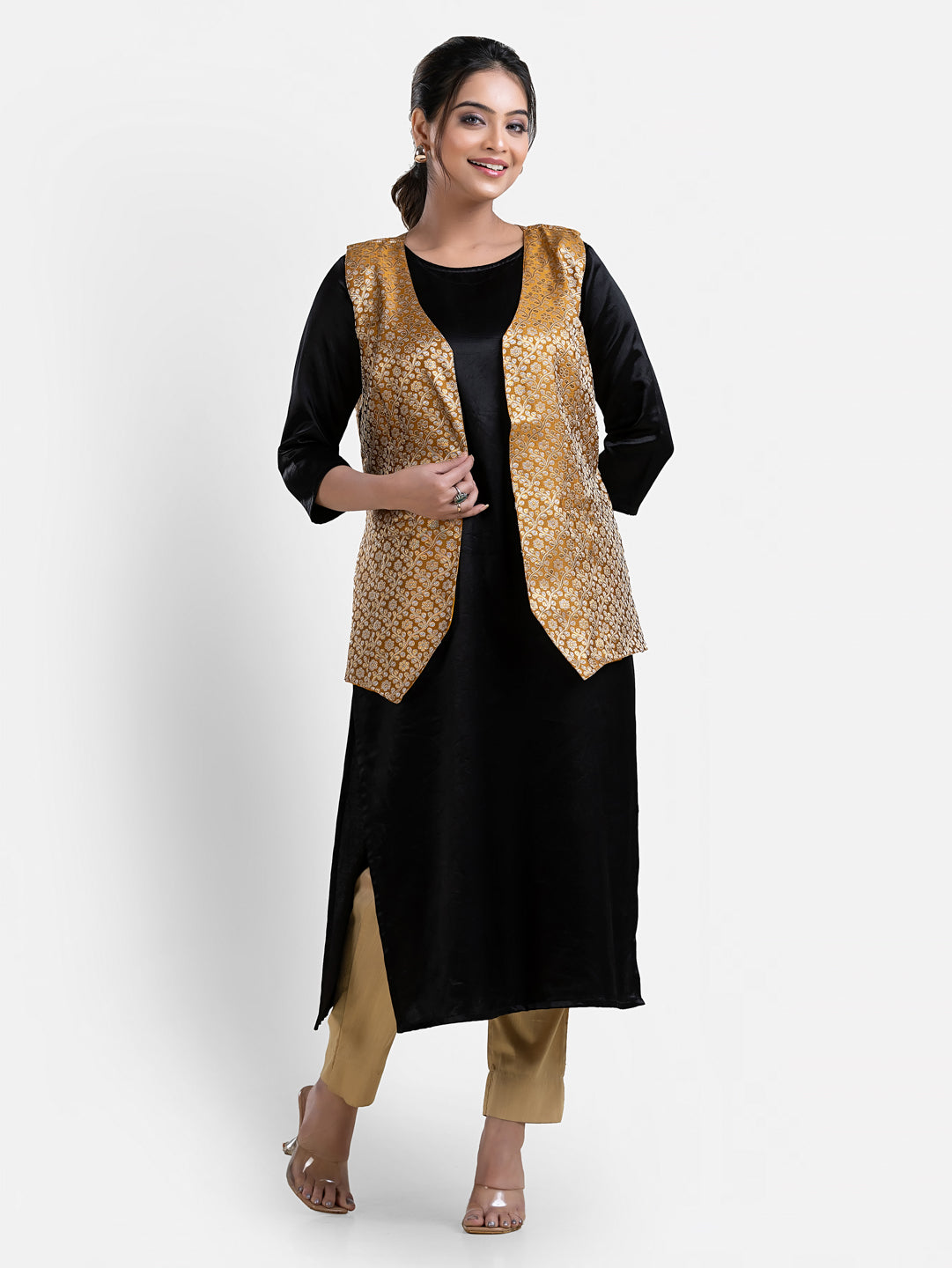 Women's yellow sleeveless brocade jacket from Crazy Needle Online, featuring intricate fabric and stylish design.
