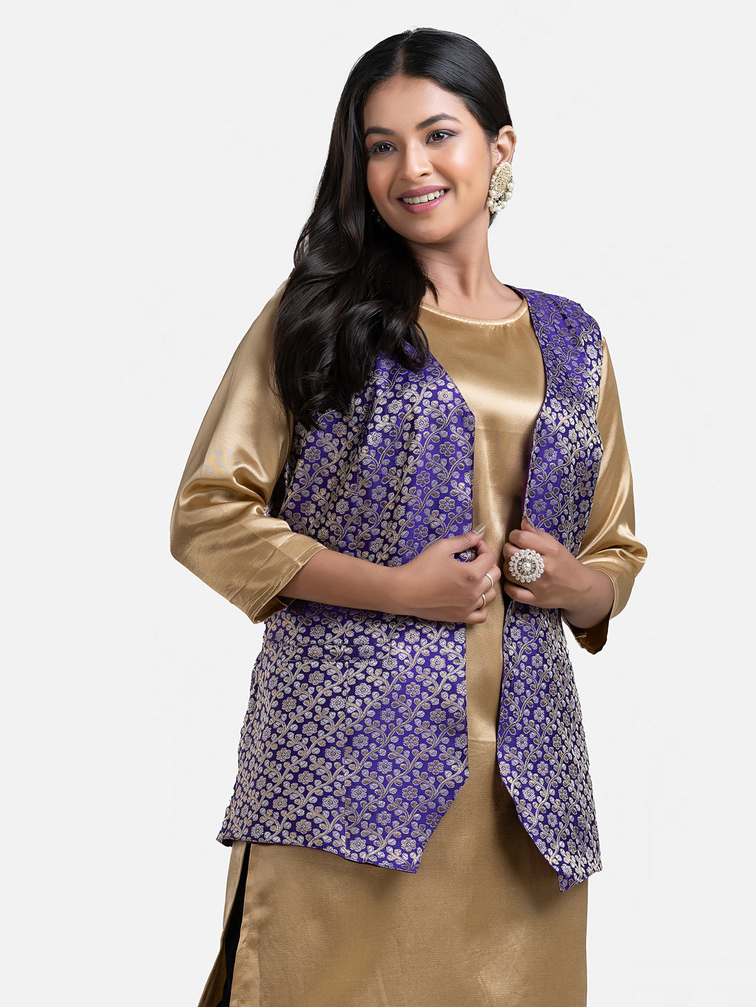 Women's blue sleeveless brocade jacket by Crazy Needle Online, featuring intricate pattern and elegant design.
