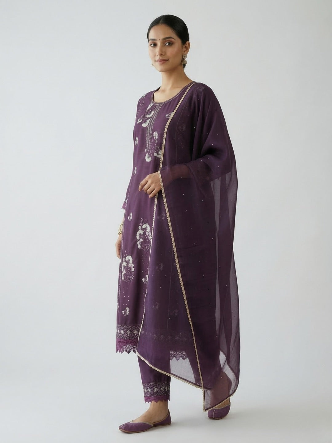 Women's purple thread work kurti pant set with dupatta, featuring intricate embroidery and traditional design.