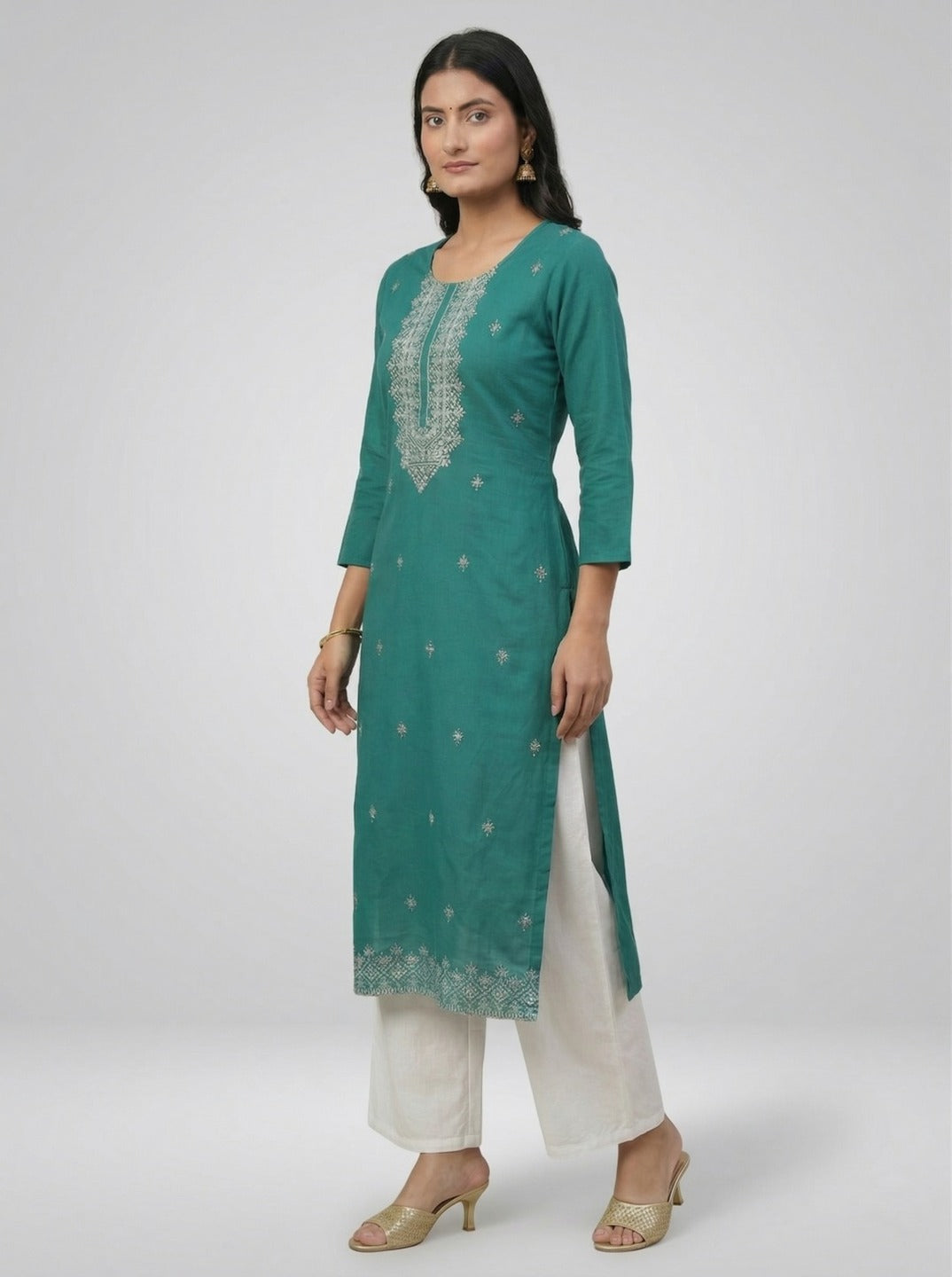 Women’s green handwork kurti, traditional Indian kurta with intricate embroidery, by Crazy Needle Online, displayed on a hanger.