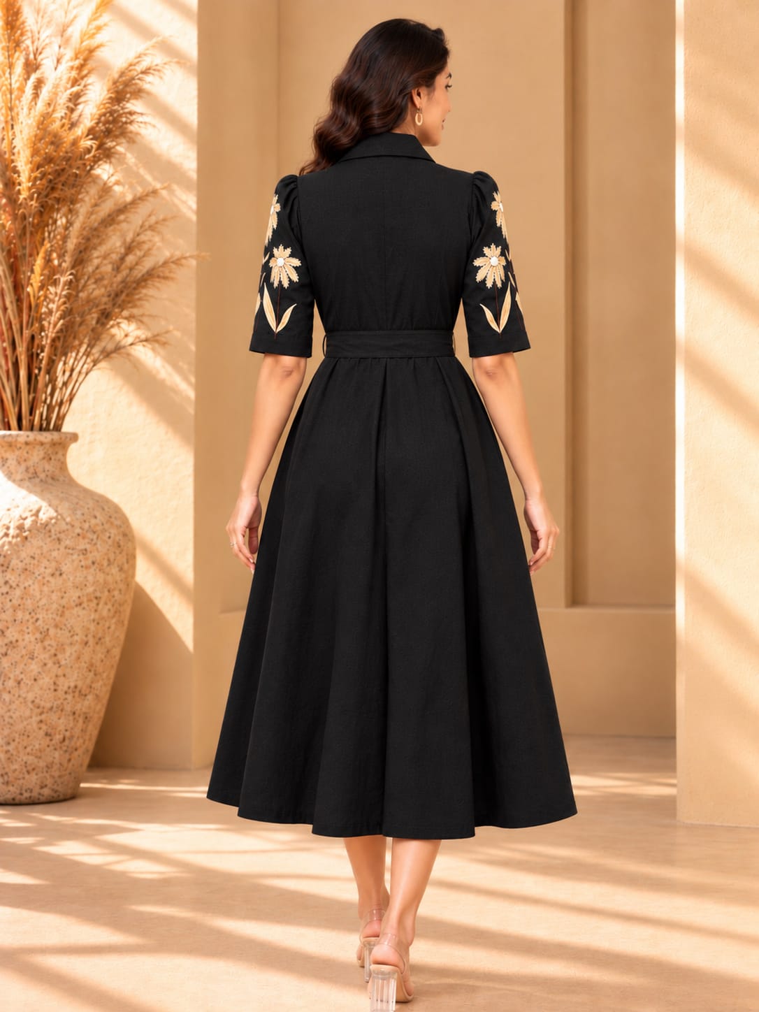 Women's hand-painted black dress by Crazy Needle Online, featuring intricate designs and a stylish, flowing silhouette.