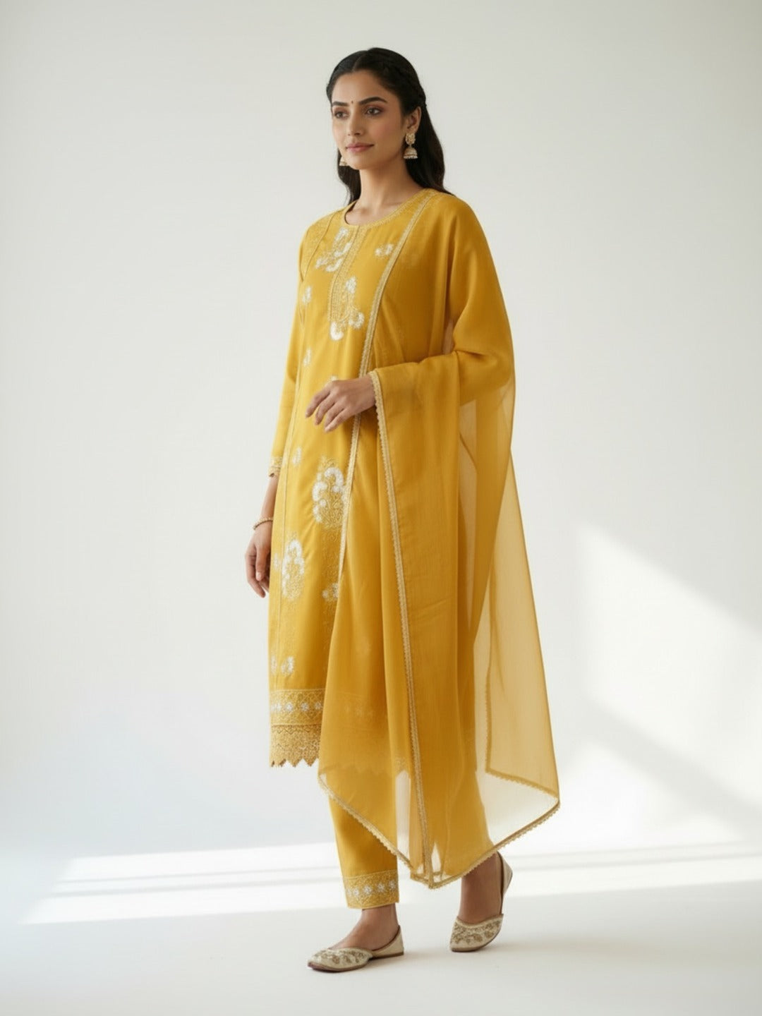 Yellow women's thread work kurti pant set with dupatta, featuring intricate embroidery, from Crazy Needle Online.