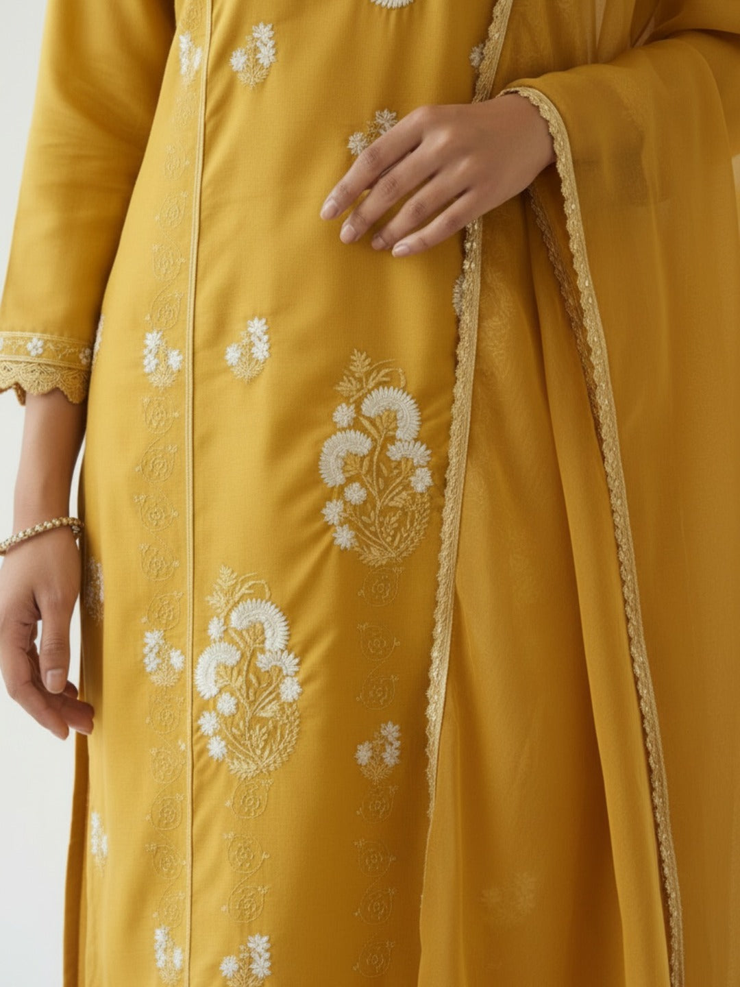 Women's yellow thread work kurti pant set with dupatta, featuring intricate embroidery and traditional design by Crazy Needle Online.