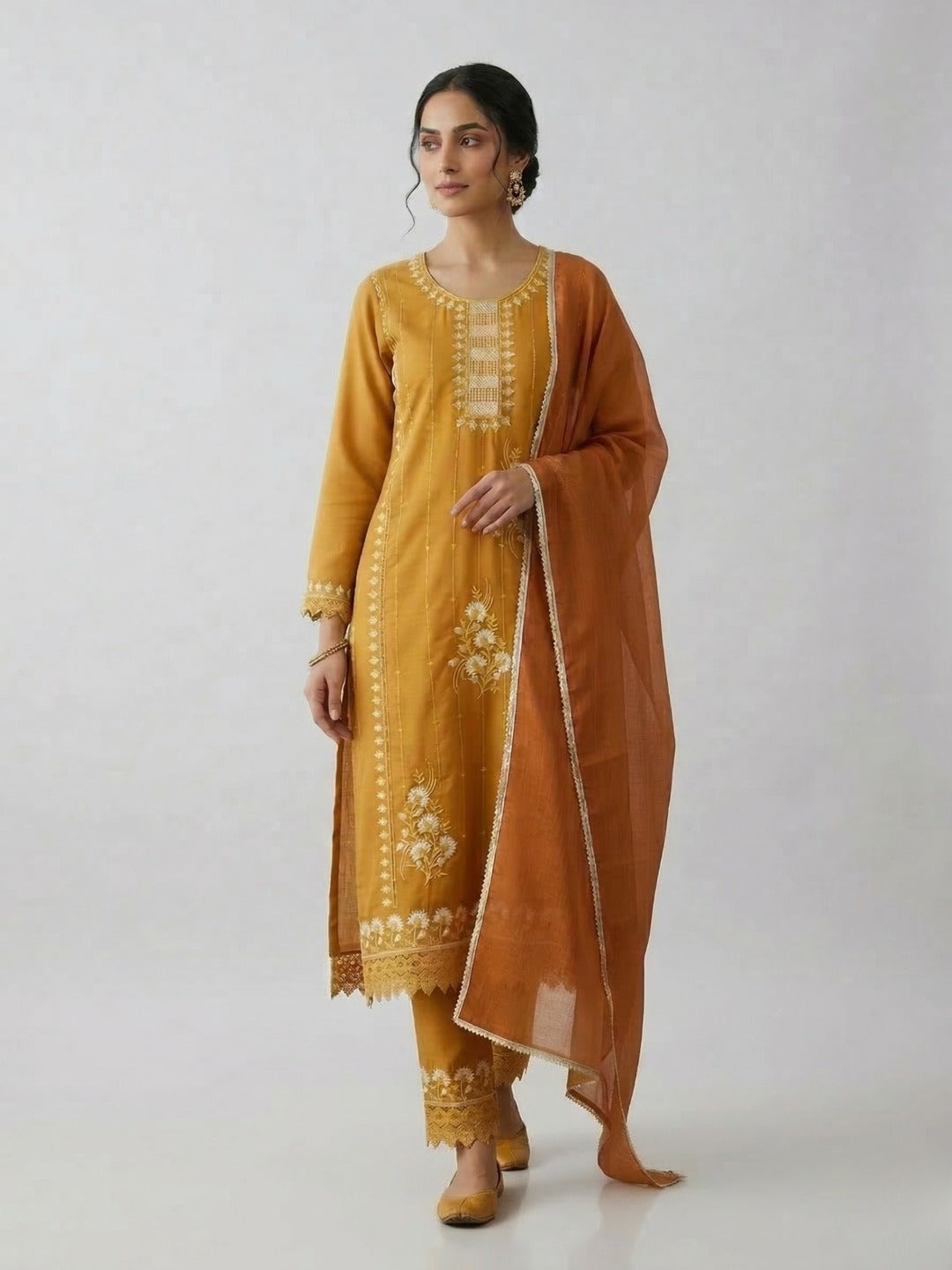 Women's yellow handwork kurti pant set with dupatta, featuring intricate embroidery, by Crazy Needle Online.
