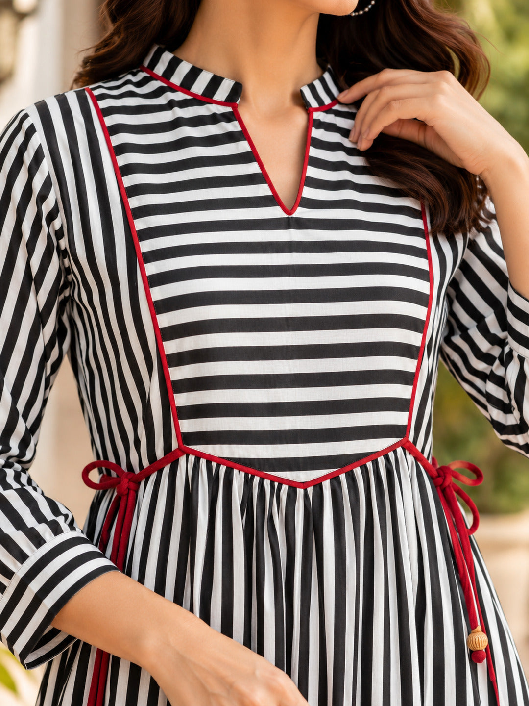 Women's black 3/4-sleeve dress by Crazy Needle Online, front view