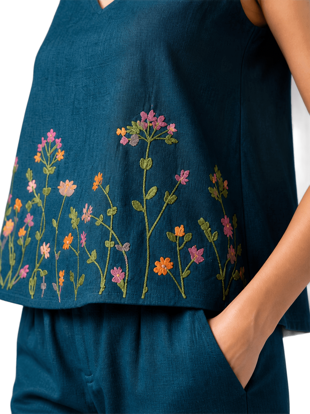 Women’s blue embroidered co-ord set with sleeveless top and wide-leg pants from Crazy Needle Online, displayed on a hanger.