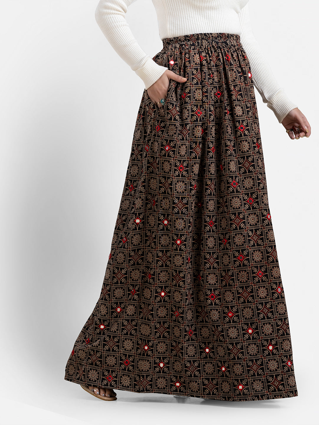 Women's printed black skirt from Crazy Needle Online, featuring a stylish design and comfortable fit.