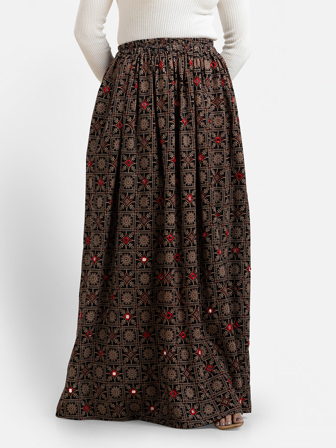 Women's printed black skirt by Crazy Needle Online featuring a stylish design and comfortable fit.