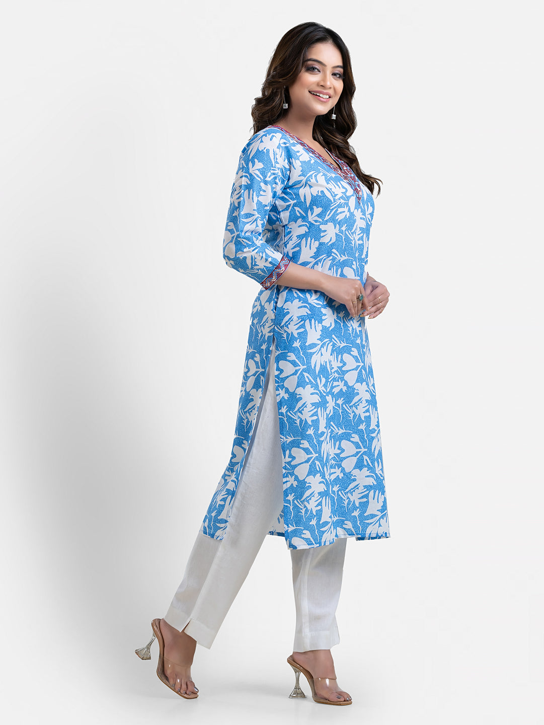 Sky blue printed women's kurti with V-neck design by Crazy Needle Online, showcasing intricate patterns and comfortable fit.