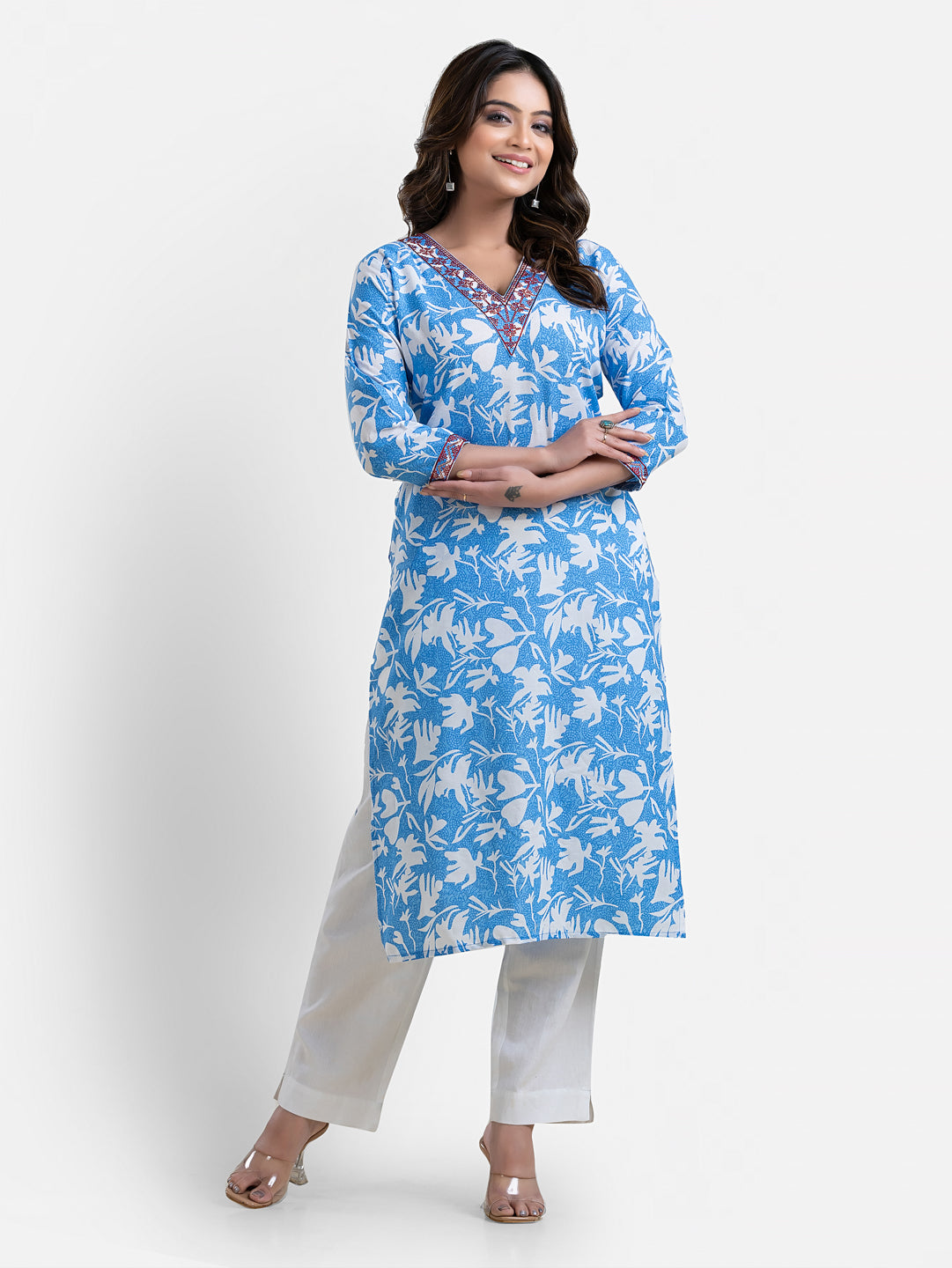Sky blue printed women's kurti with V-neck and three-quarter sleeves, featuring floral patterns from Crazy Needle Online.