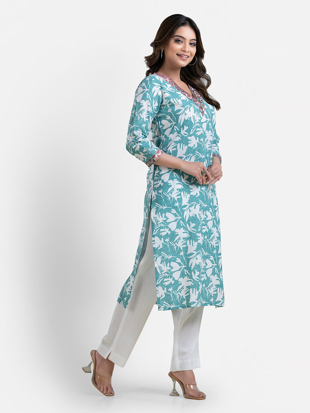 Women’s green printed V-neck kurti by Crazy Needle Online, featuring floral design and lightweight fabric.