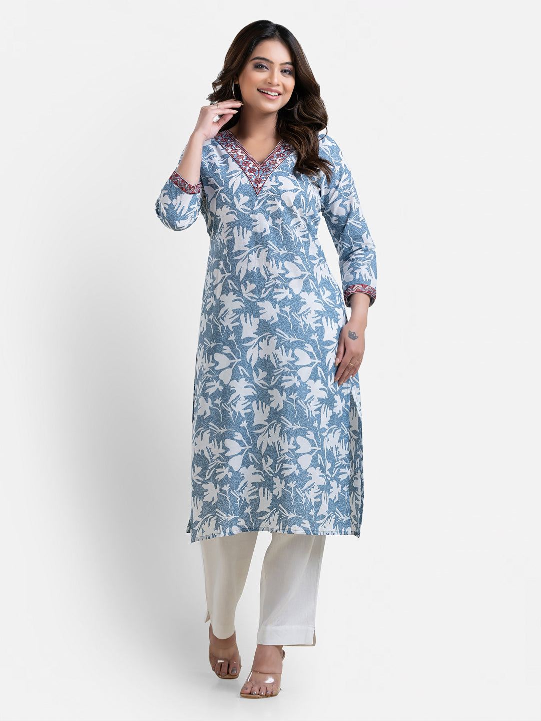 Light blue printed women's kurti with V-neck design by Crazy Needle Online, showcasing a stylish and comfortable traditional outfit.