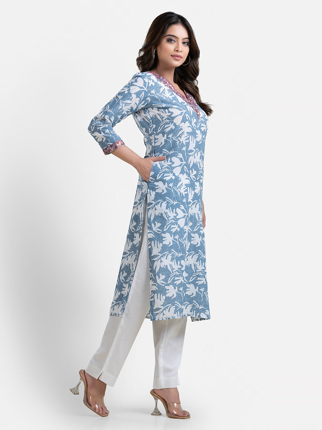 Light blue printed women's kurti with V-neck from Crazy Needle Online, showcasing the fabric and design details.