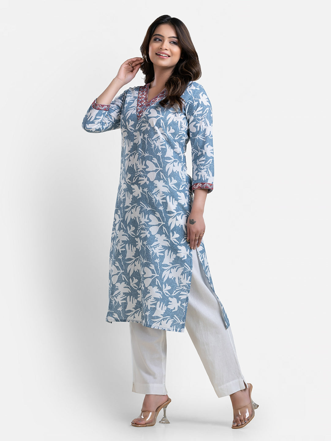 Light blue printed women's kurti with V-neck design from Crazy Needle Online, showcasing intricate patterns and comfortable fit.