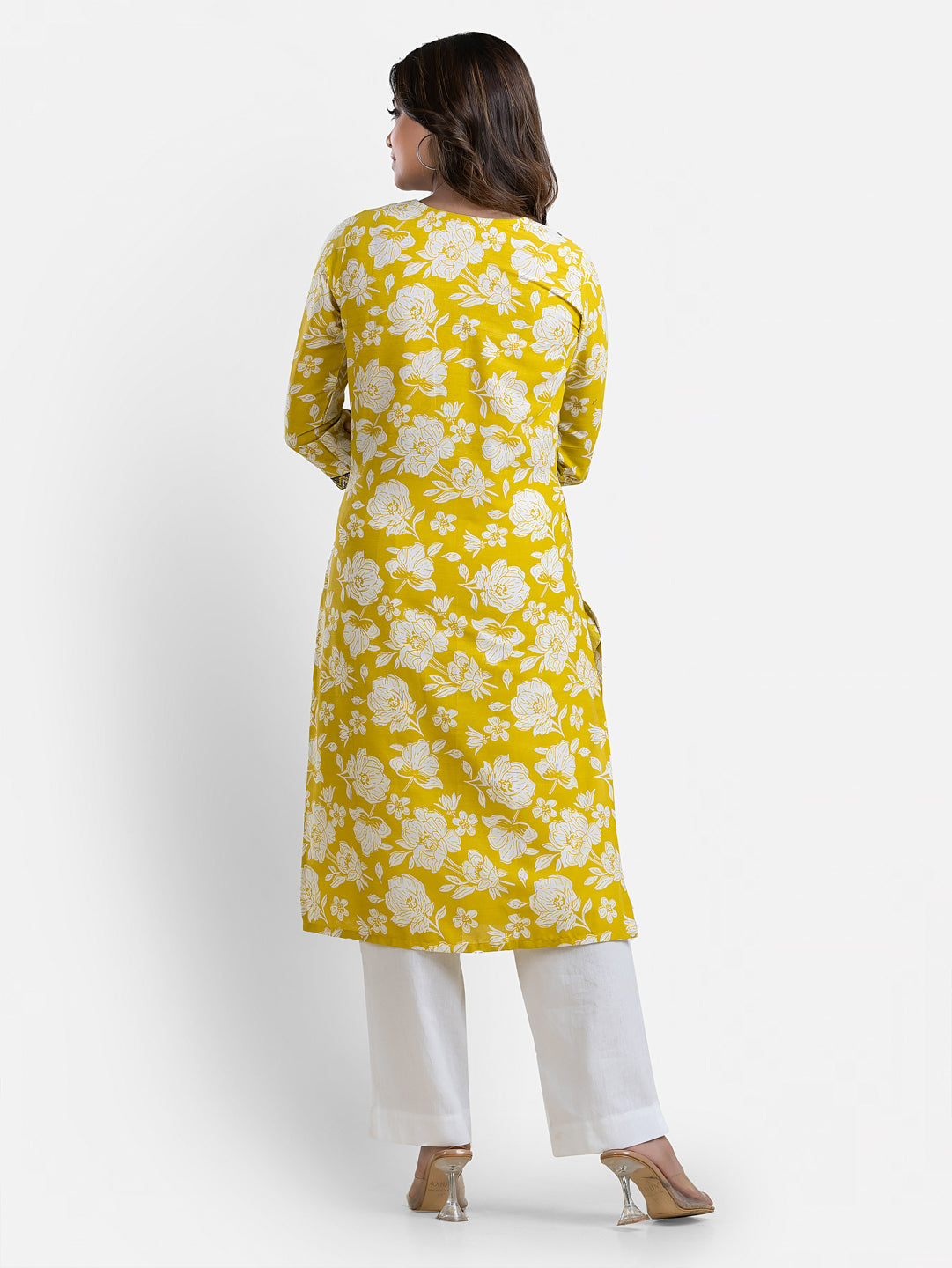 Yellow printed women's kurti with V-neck design from Crazy Needle Online, showcasing vibrant floral patterns and comfortable fit.