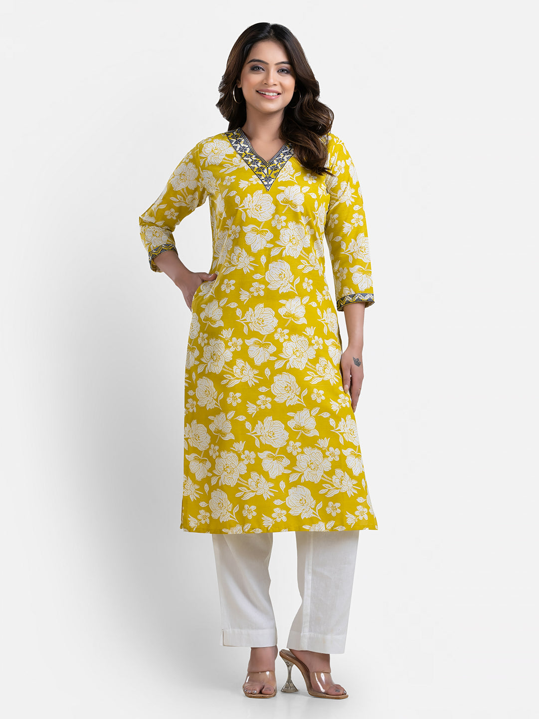 Yellow printed women's kurti with a V-neck design from Crazy Needle Online, showcasing the stylish and comfortable attire.