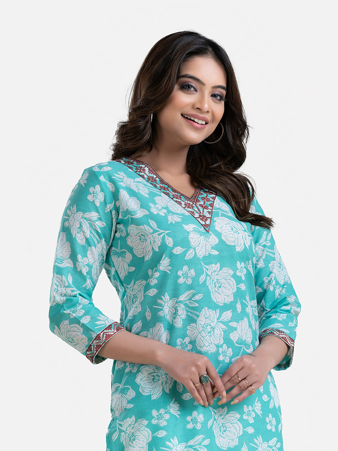 Green printed women's kurti with V-neck neckline, stylish and comfortable, by Crazy Needle Online.