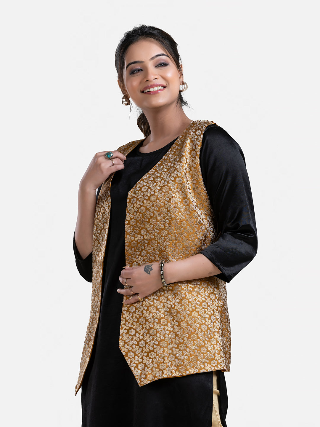 Women's yellow sleeveless brocade jacket from Crazy Needle Online, showcasing detailed fabric and stylish design.