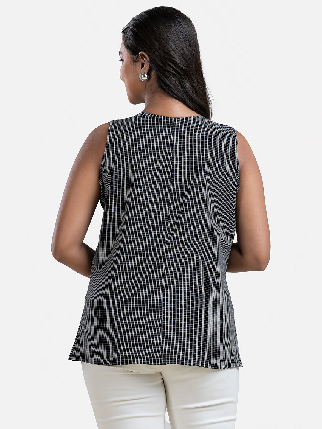 Black sleeveless women's top by Crazy Needle Online, Dhonekhali style, shown in a casual fit on a model.