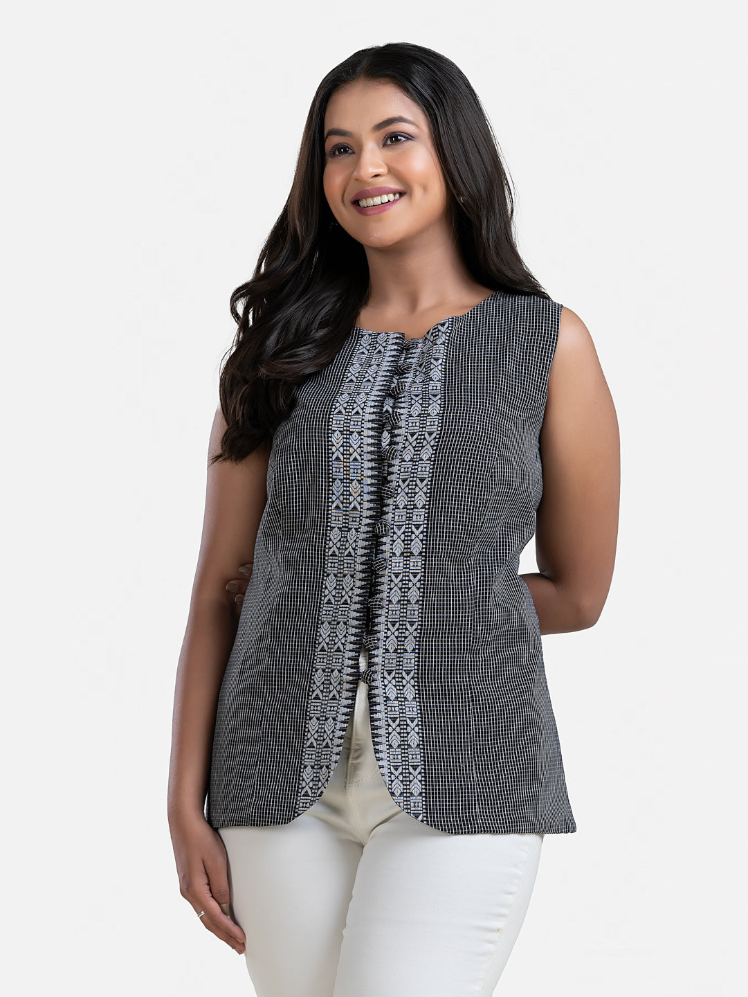 Black sleeveless top for women by Crazy Needle Online, Dhonekhali style, featuring a fitted design and sleeveless cut.