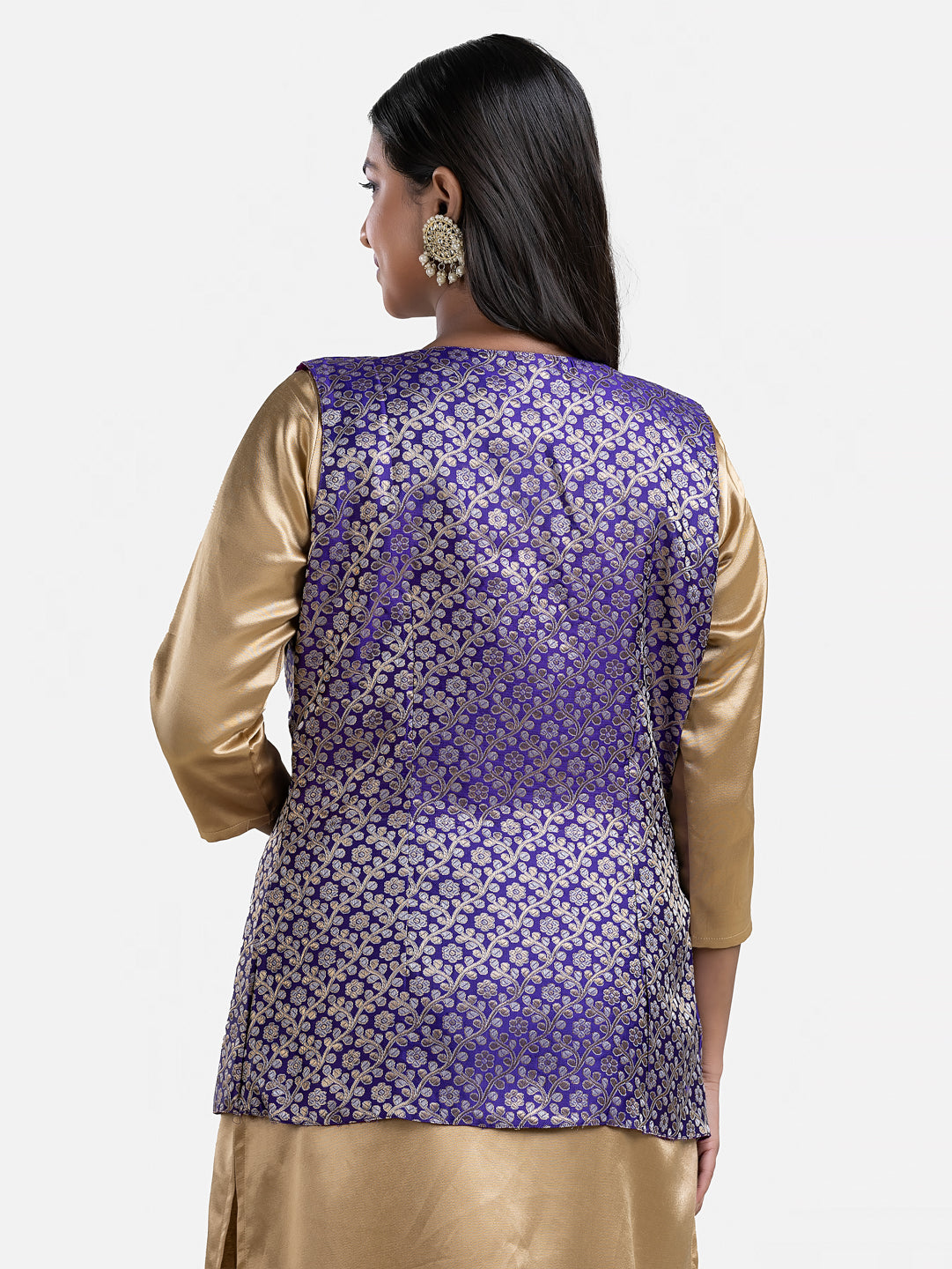 Women's blue sleeveless brocade jacket by Crazy Needle Online, featuring intricate embroidered fabric and elegant design.