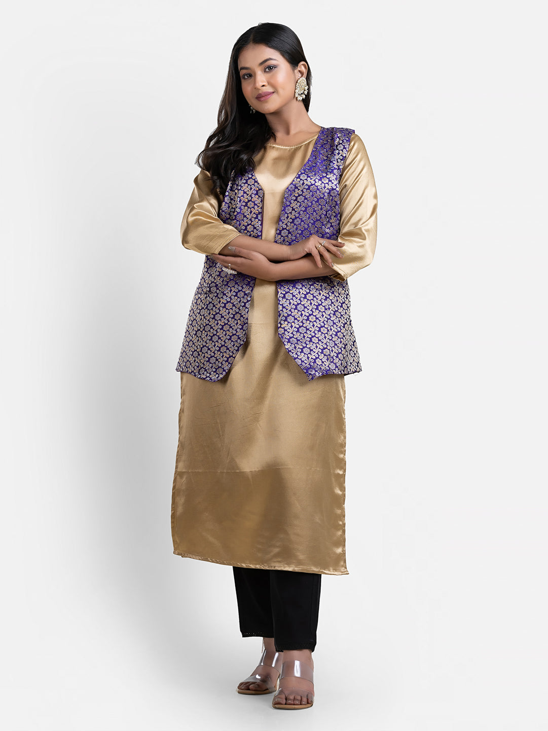 Women's blue sleeveless brocade jacket from Crazy Needle Online, featuring intricate fabric and stylish design.
