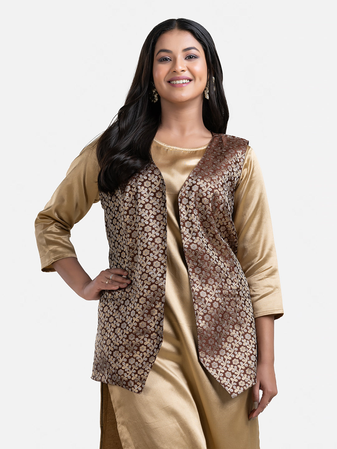Women's brown sleeveless brocade jacket from Crazy Needle Online, featuring intricate fabric and stylish design.
