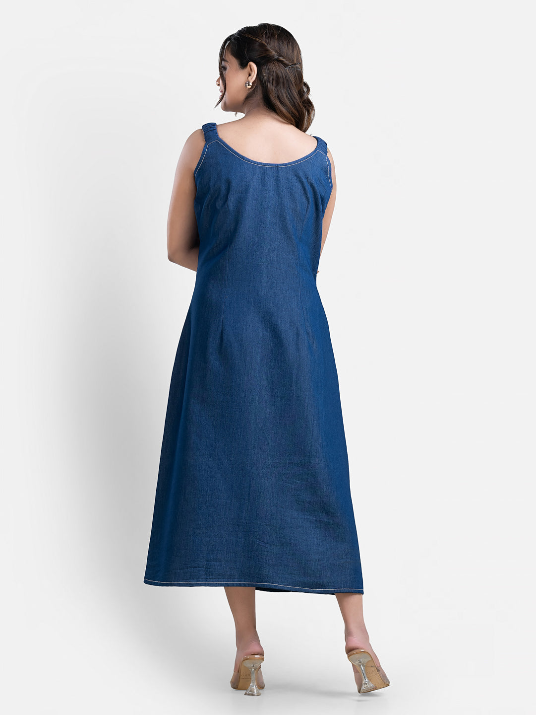 Women's sleeveless denim long dress by Crazy Needle Online, featuring a casual fit and classic blue denim fabric.