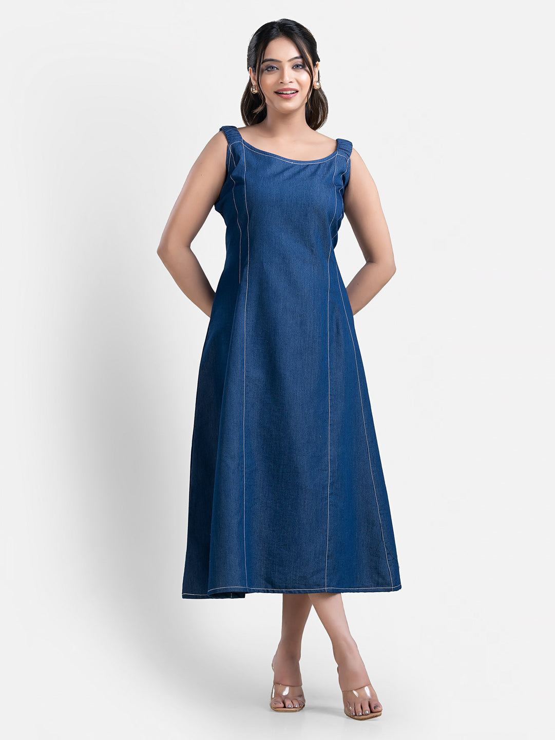 Women's sleeveless denim long dress by Crazy Needle Online, featuring a casual fit and classic blue denim fabric.