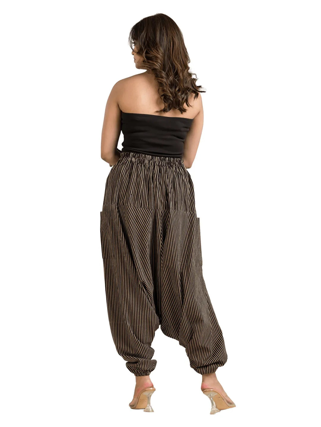 Women's black cotton harem pants with white striped and printed patterns, relaxed fit, and fold-over waistband.