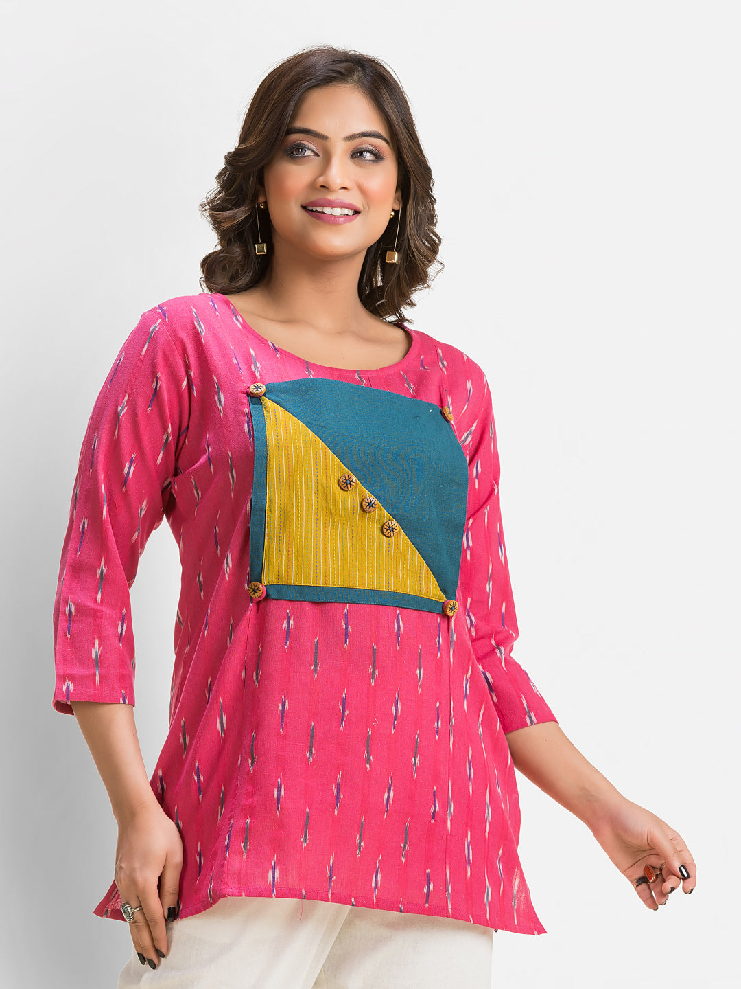 Women's pink cotton Ikkat patchwork top by Crazy Needle Online, featuring traditional design and comfortable fit.