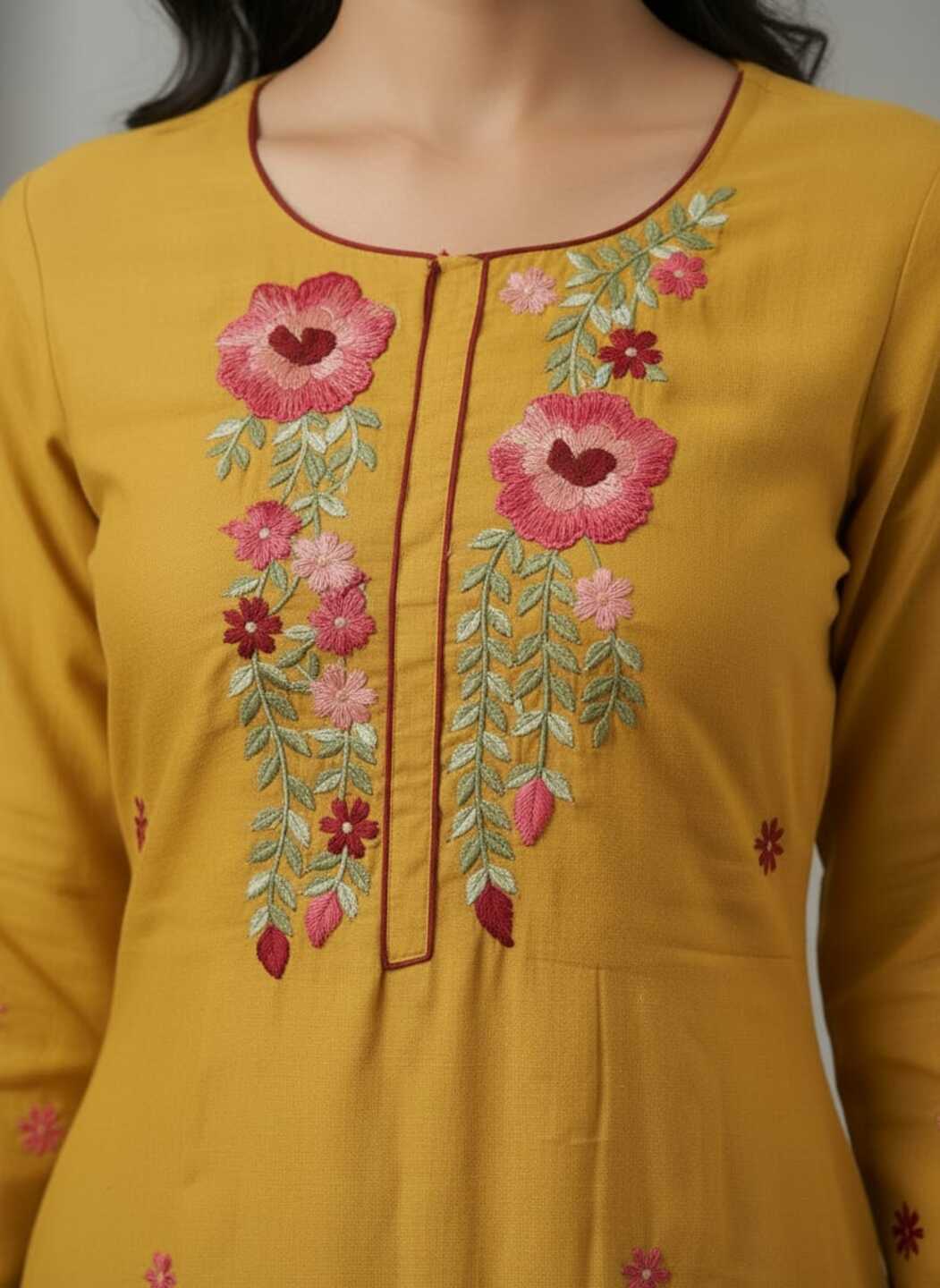 Yellow women's kurti with round neck from Crazy Needle Online, featuring a stylish and comfortable traditional kurta design.