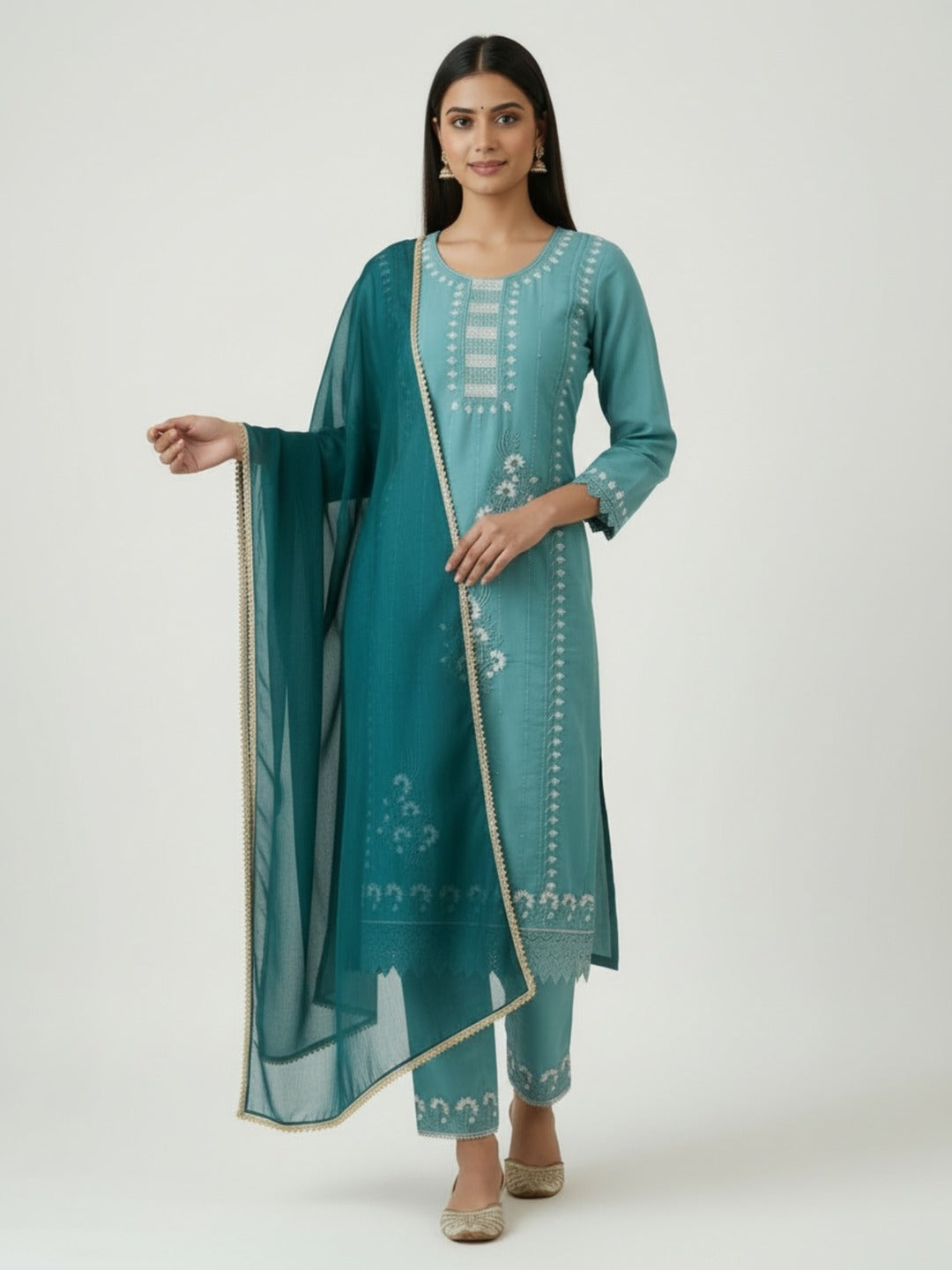 Three images of a women's green handwork kurti and pant set with dupatta by Crazy Needle Online, showcasing intricate embroidery and fabric details.