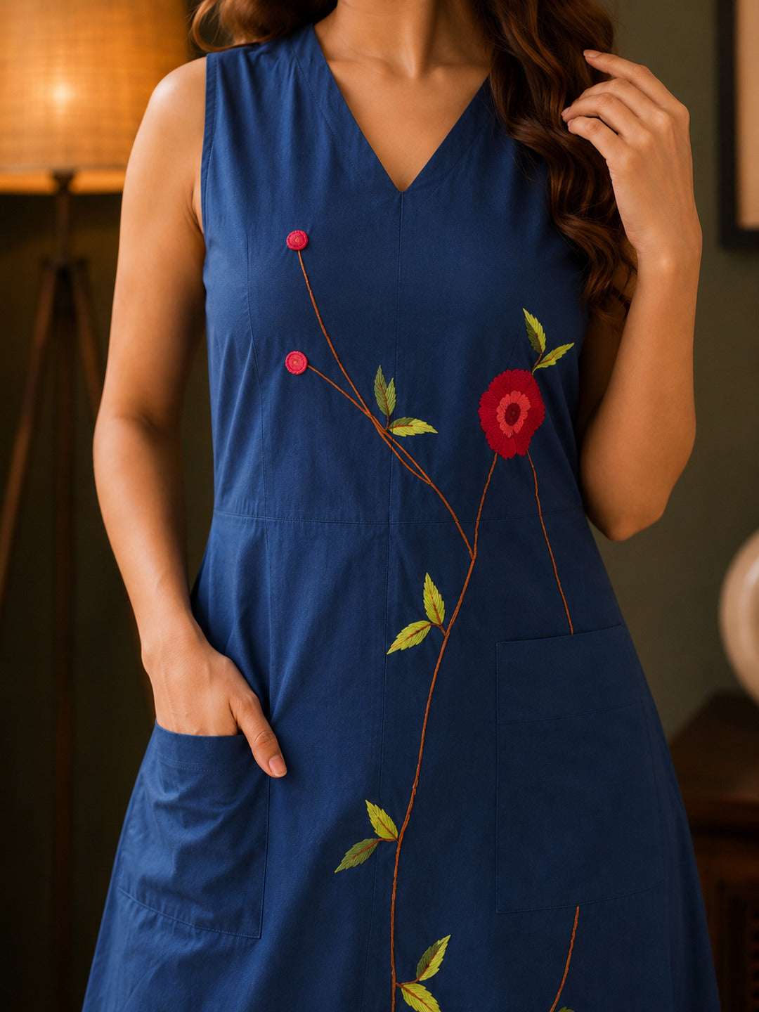 Women's embroidered blue dress with intricate handwork, showcasing detailed embroidery and elegant design from Crazy Needle Online.